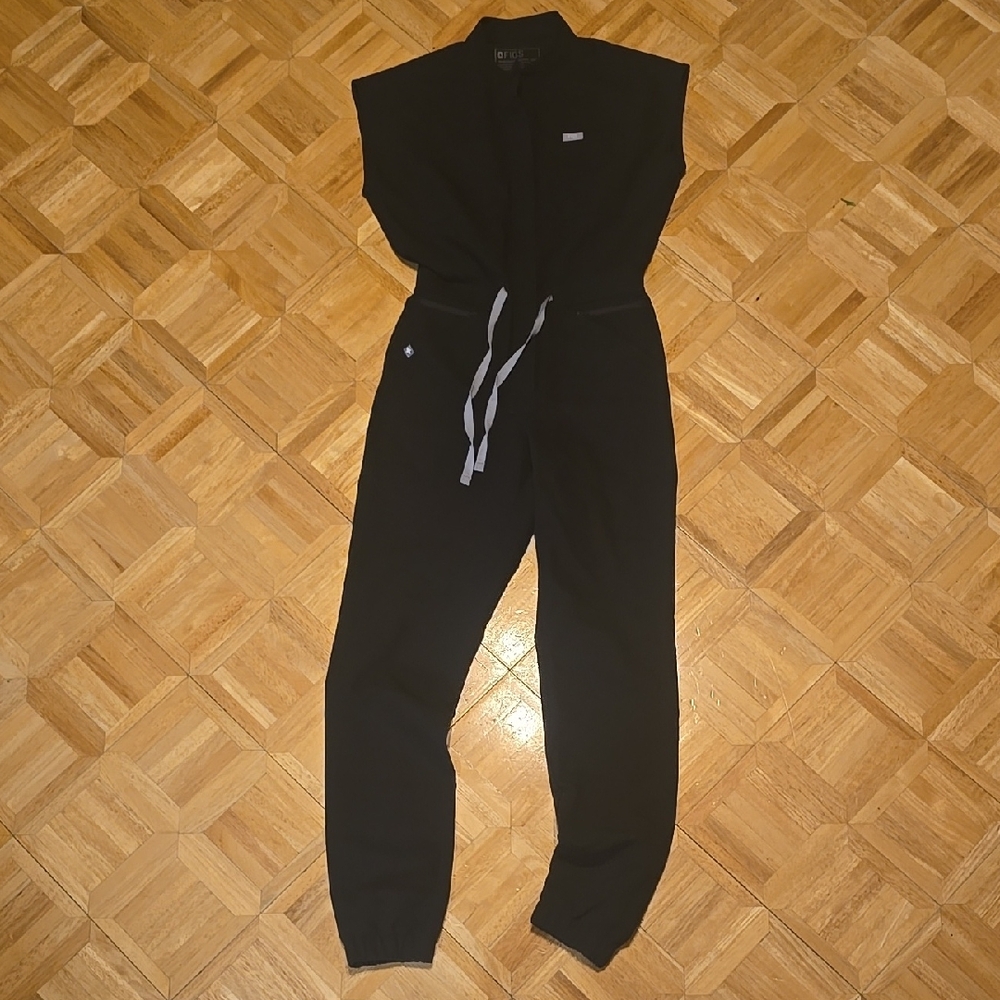 Figs Black Sleeveless Jumpsuit with Mock Neck and Tapered Legs